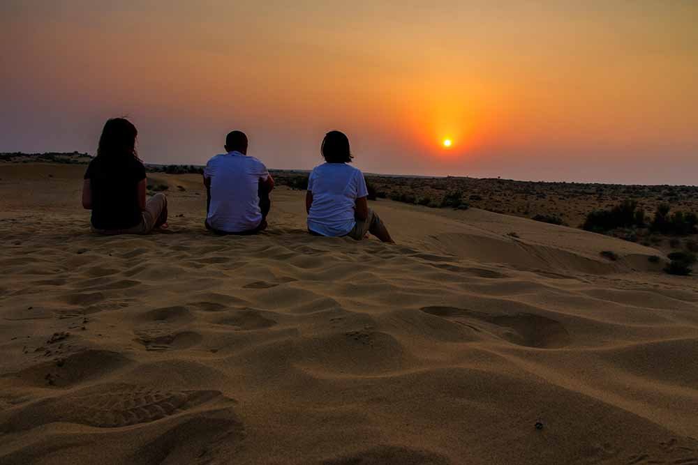 Sitting on the Sand Looking the Sun
