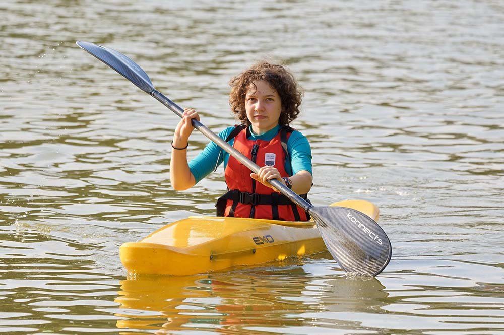 Kid on kayak joyride in Dubai
