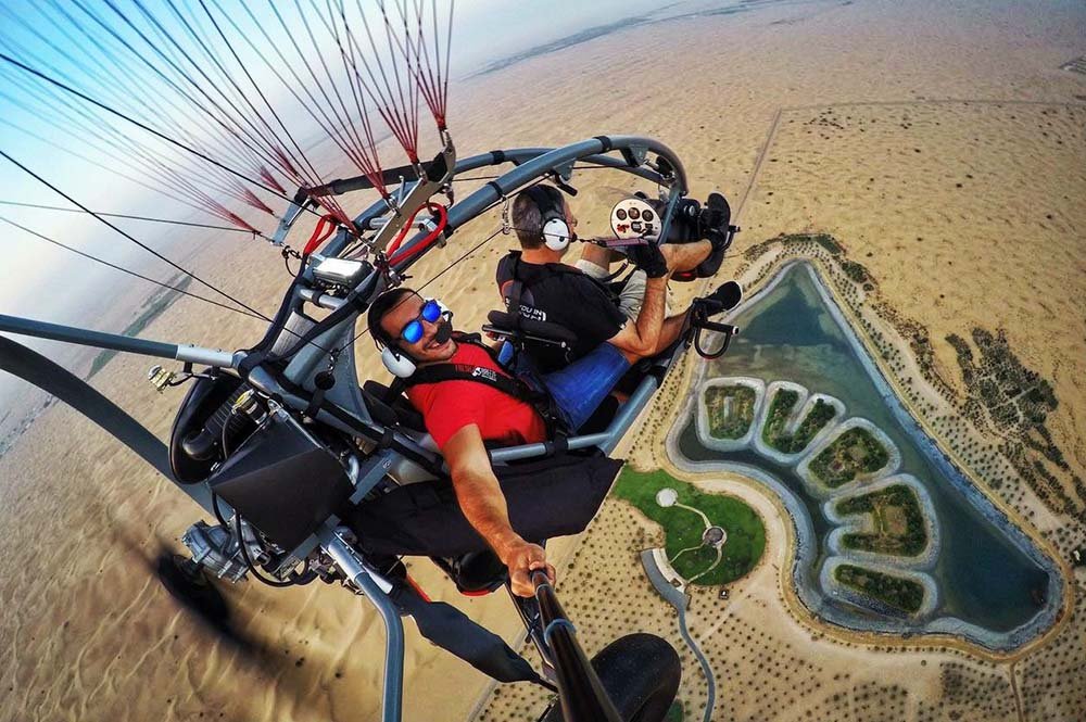 Paramotor flight flying over the Dubai Lake at DDCR