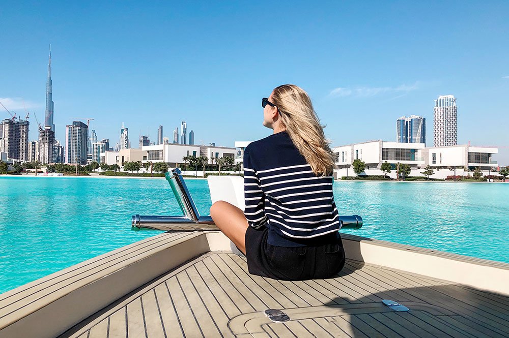 Woman Sitting on Yacht